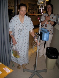 woman walking hospital corridor with catheter courtesy of Kikkan Randall